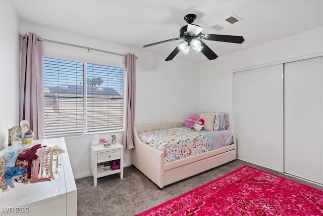 600 Beresford Ave, Las Vegas, NV 89123 - bedroom with light carpet, a ceiling fan, and a closet