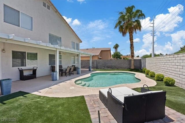 600 Beresford Ave, Las Vegas, NV 89123 - view of pool featuring a fenced backyard, a patio, ceiling fan, and outdoor dining area