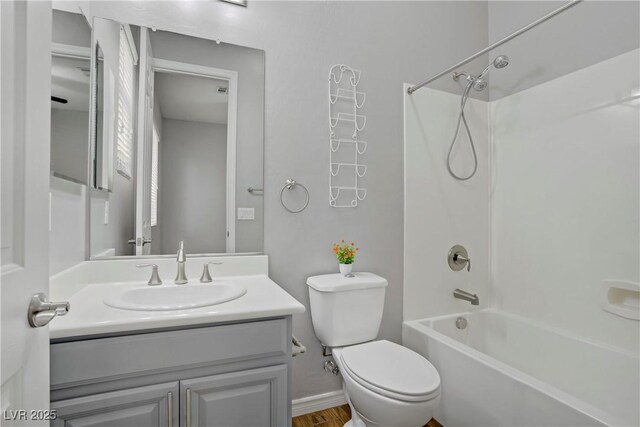 9779 Mosaic Canyon Ct, Las Vegas, NV 89149 - full bathroom featuring shower / tub combination, vanity, toilet, and wood finished floors