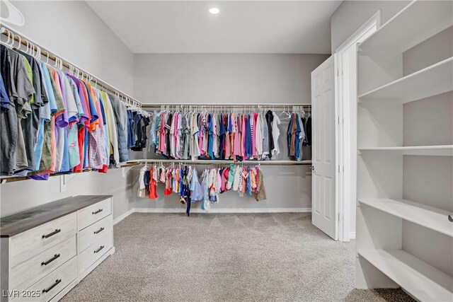 9779 Mosaic Canyon Ct, Las Vegas, NV 89149 - walk in closet with carpet floors