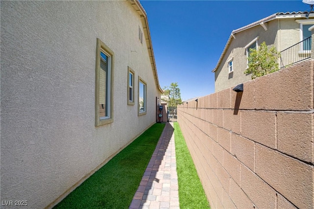 9779 Mosaic Canyon Ct, Las Vegas, NV 89149 - view of side of home with stucco siding