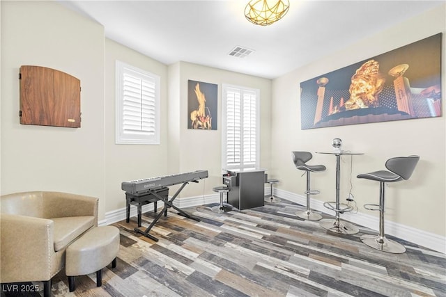 7504 Frittata Ave, Las Vegas, NV 89113 - sitting room with wood finished floors and baseboards