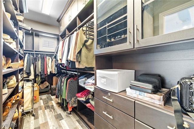 7504 Frittata Ave, Las Vegas, NV 89113 - spacious closet with wood finished floors