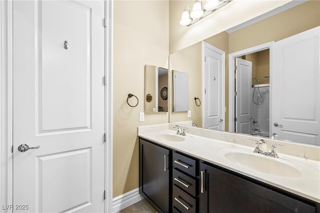 7504 Frittata Ave, Las Vegas, NV 89113 - full bathroom with double vanity and a shower