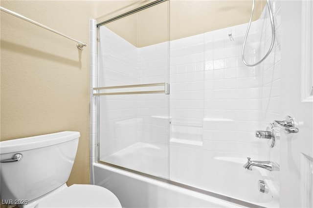 7504 Frittata Ave, Las Vegas, NV 89113 - full bathroom featuring toilet and combined bath / shower with glass door