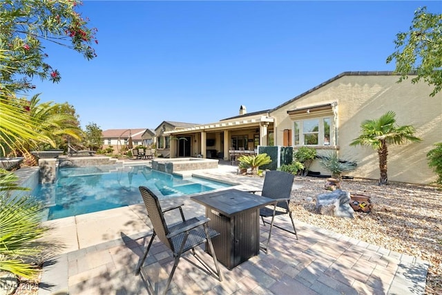 7504 Frittata Ave, Las Vegas, NV 89113 - view of pool with a patio area and a pool with connected hot tub