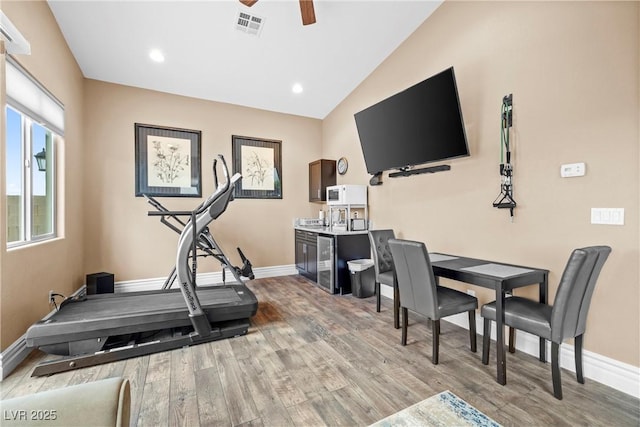 7504 Frittata Ave, Las Vegas, NV 89113 - exercise area featuring light wood-type flooring, baseboards, a ceiling fan, vaulted ceiling, and recessed lighting