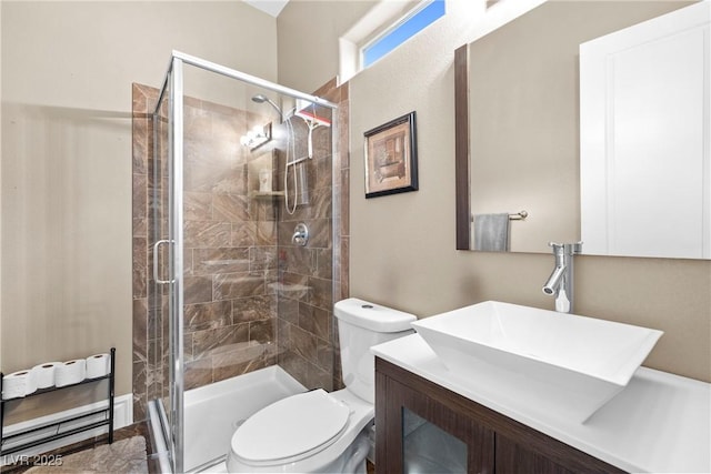 7504 Frittata Ave, Las Vegas, NV 89113 - bathroom featuring toilet, vanity, and a shower stall