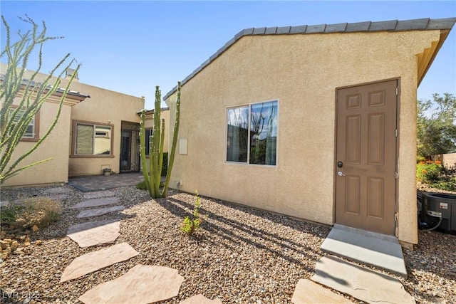 7504 Frittata Ave, Las Vegas, NV 89113 - view of front of house featuring stucco siding and central air condition unit