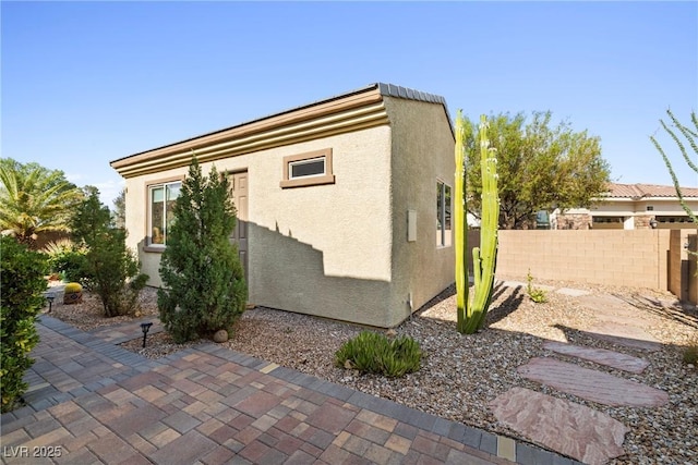 7504 Frittata Ave, Las Vegas, NV 89113 - view of home's exterior with stucco siding