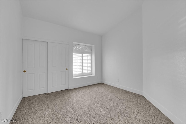 5437 Escallonia St, Las Vegas, NV 89149 - unfurnished bedroom with baseboards, carpet floors, and a closet