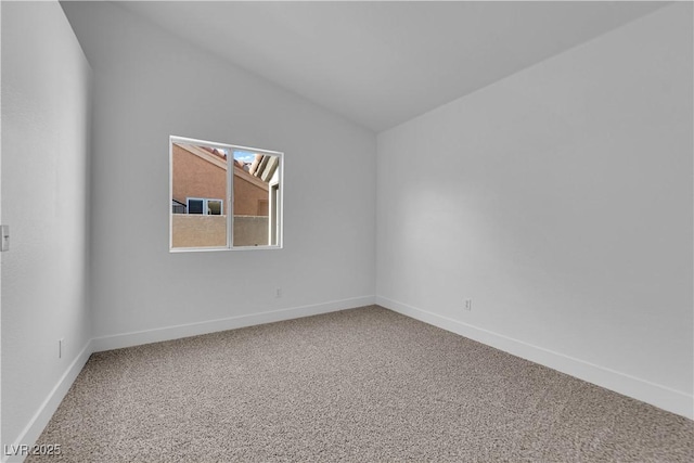 5437 Escallonia St, Las Vegas, NV 89149 - carpeted spare room with baseboards and lofted ceiling
