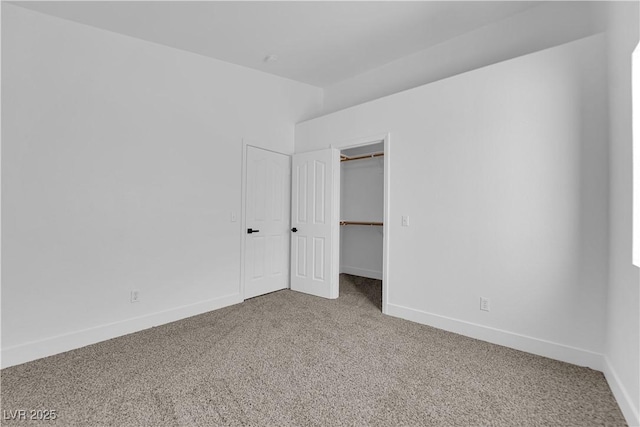 5437 Escallonia St, Las Vegas, NV 89149 - unfurnished bedroom featuring carpet flooring, baseboards, a spacious closet, and a closet