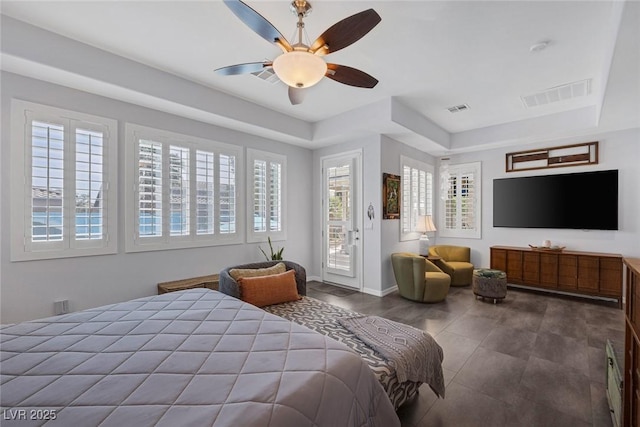 6173 Sabine Ranch Rd, Las Vegas, NV 89131 - bedroom featuring access to outside, a ceiling fan, a tray ceiling, and baseboards
