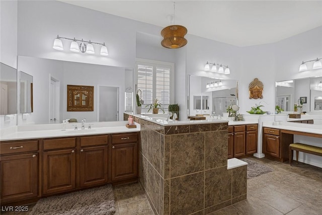 6173 Sabine Ranch Rd, Las Vegas, NV 89131 - full bathroom featuring two vanities and tile patterned floors