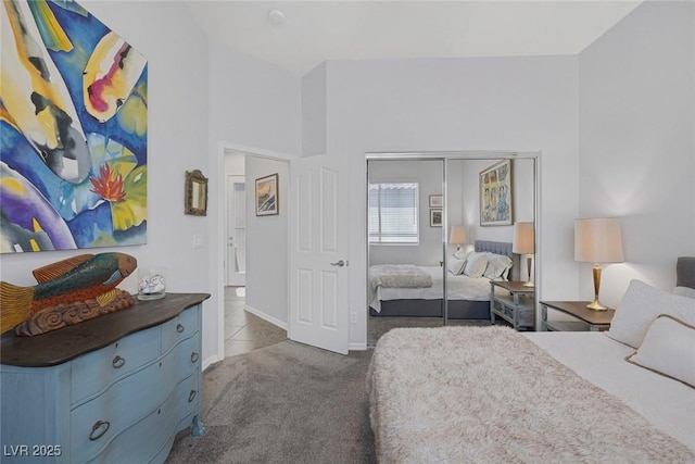 6173 Sabine Ranch Rd, Las Vegas, NV 89131 - carpeted bedroom with a closet and baseboards