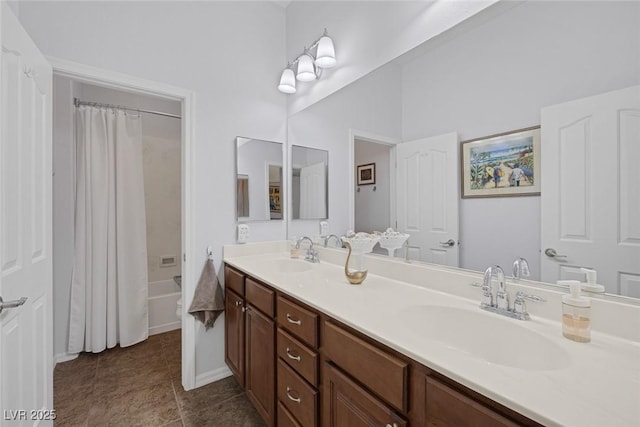 6173 Sabine Ranch Rd, Las Vegas, NV 89131 - bathroom with double vanity, shower / tub combo with curtain, tile patterned floors, and baseboards