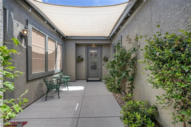 6173 Sabine Ranch Rd, Las Vegas, NV 89131 - doorway to property with stucco siding