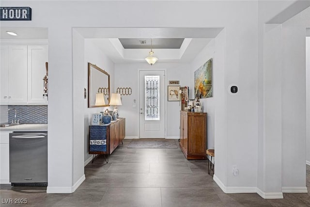 6173 Sabine Ranch Rd, Las Vegas, NV 89131 - entrance foyer featuring baseboards and a tray ceiling