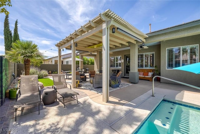 6173 Sabine Ranch Rd, Las Vegas, NV 89131 - fenced backyard with an outdoor hangout area, a ceiling fan, and a patio