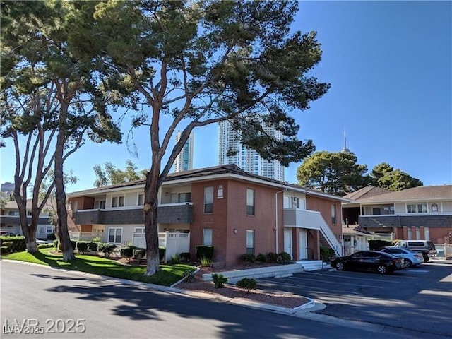 634 Oakmont Ave Unit 1903, Las Vegas, NV 89109 - view of building exterior with uncovered parking