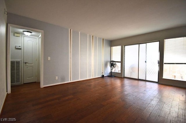 634 Oakmont Ave Unit 1903, Las Vegas, NV 89109 - unfurnished room featuring wood finished floors and baseboards