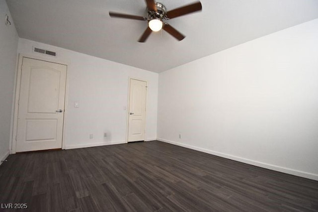 634 Oakmont Ave Unit 1903, Las Vegas, NV 89109 - spare room with ceiling fan, dark wood-type flooring, and baseboards