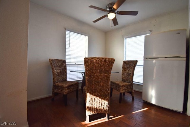 634 Oakmont Ave Unit 1903, Las Vegas, NV 89109 - dining space with a ceiling fan, plenty of natural light, and wood finished floors