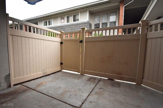 634 Oakmont Ave Unit 1903, Las Vegas, NV 89109 - gate with a patio area
