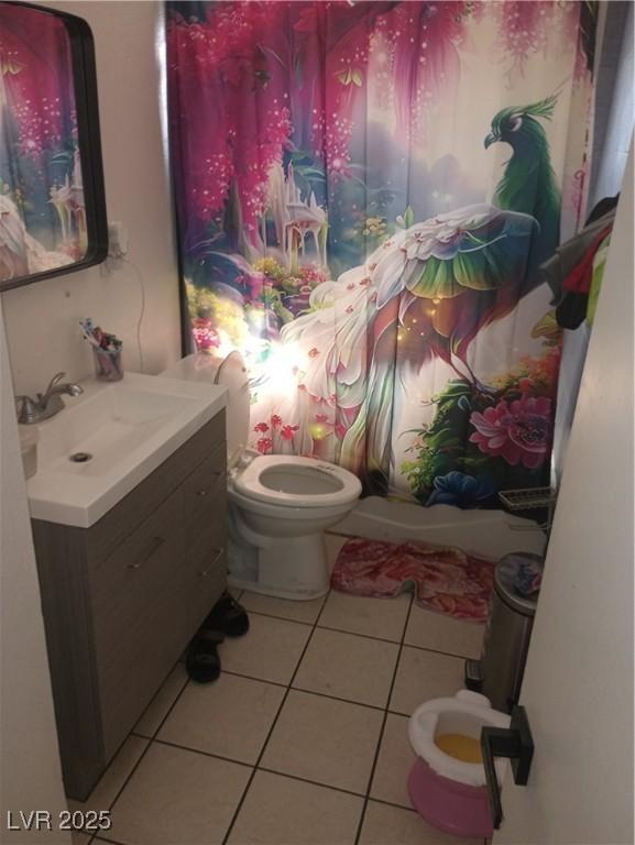 2409 Maroney Ave, Las Vegas, NV 89104 - bathroom with tile patterned flooring and vanity