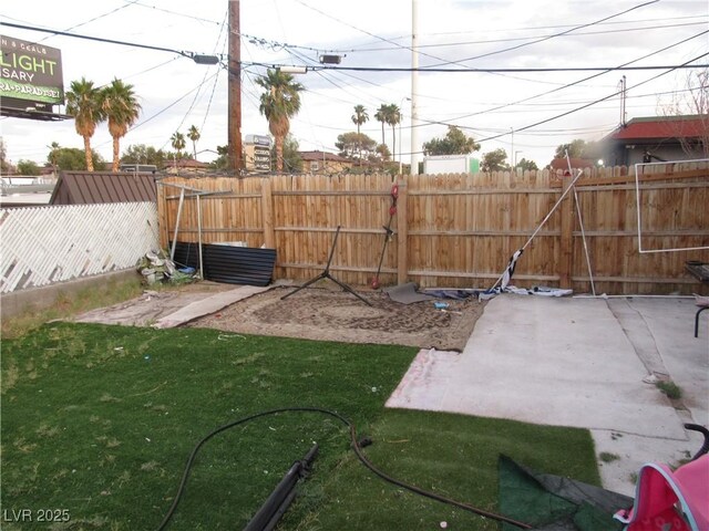 2409 Maroney Ave, Las Vegas, NV 89104 - fenced backyard featuring a patio