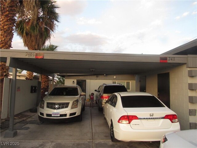 2409 Maroney Ave, Las Vegas, NV 89104 - view of parking featuring an attached carport