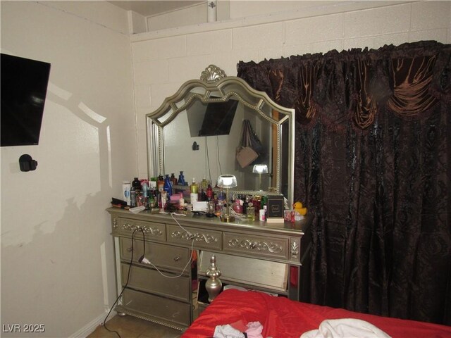 2409 Maroney Ave, Las Vegas, NV 89104 - tiled bedroom with baseboards