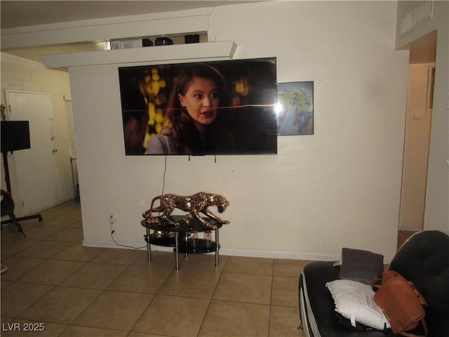 2409 Maroney Ave, Las Vegas, NV 89104 - living area featuring tile patterned floors and baseboards