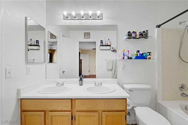 5236 Krista Alethea St, North Las Vegas, NV 89031 - bathroom featuring double vanity, toilet, and bathtub / shower combination