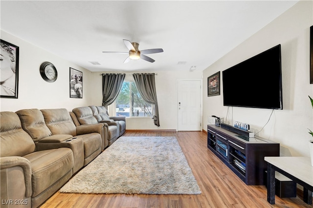 5236 Krista Alethea St, North Las Vegas, NV 89031 - living area with a ceiling fan and light wood-style floors