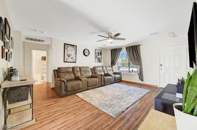 5236 Krista Alethea St, North Las Vegas, NV 89031 - living area featuring a ceiling fan, light wood-type flooring, and baseboards