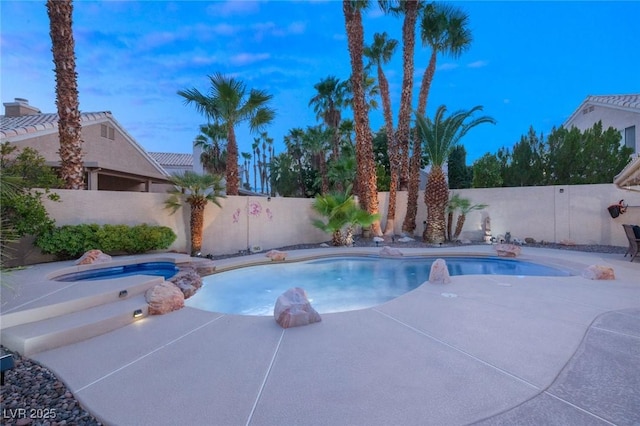 1913 Madagascar Ln, Las Vegas, NV 89117 - view of pool featuring a fenced backyard, a patio, and a pool with connected hot tub