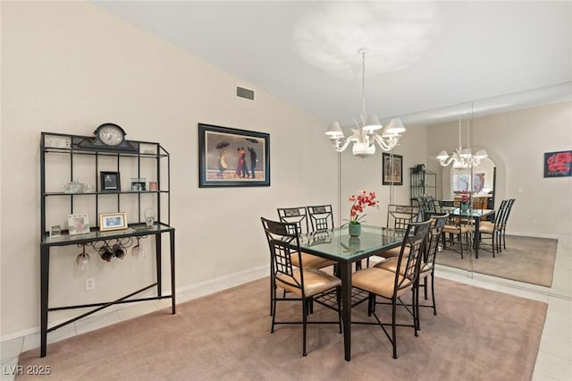 1913 Madagascar Ln, Las Vegas, NV 89117 - tiled dining room with a chandelier, baseboards, and lofted ceiling