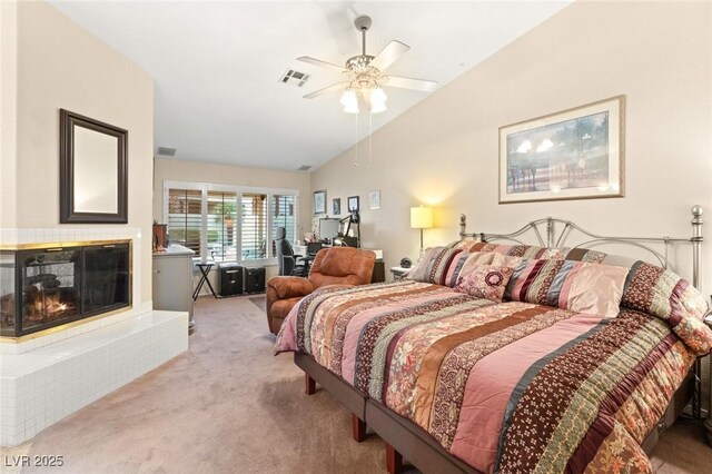 1913 Madagascar Ln, Las Vegas, NV 89117 - carpeted bedroom with lofted ceiling, a glass covered fireplace, a desk, and ceiling fan