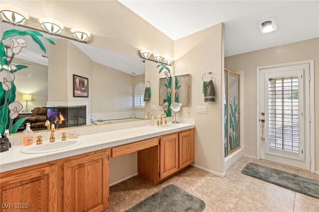 1913 Madagascar Ln, Las Vegas, NV 89117 - full bath with a shower stall, double vanity, tile patterned floors, baseboards, and lofted ceiling