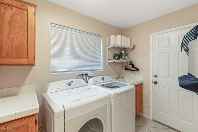 1913 Madagascar Ln, Las Vegas, NV 89117 - laundry area featuring cabinet space, washing machine and dryer, and light tile patterned floors