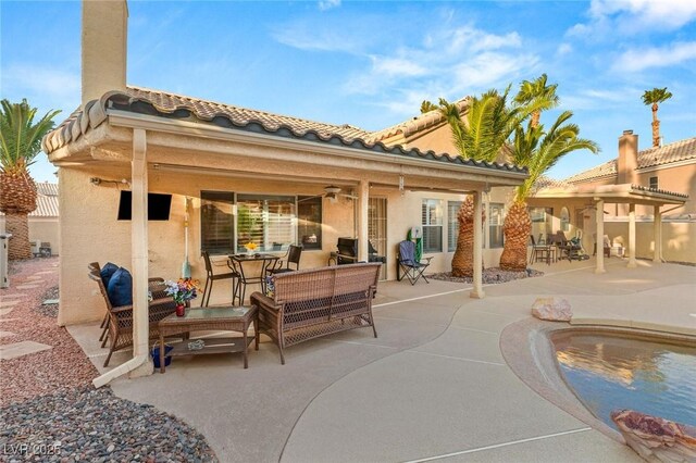 1913 Madagascar Ln, Las Vegas, NV 89117 - back of property with ceiling fan, outdoor lounge area, a patio, outdoor dining space, and a tile roof