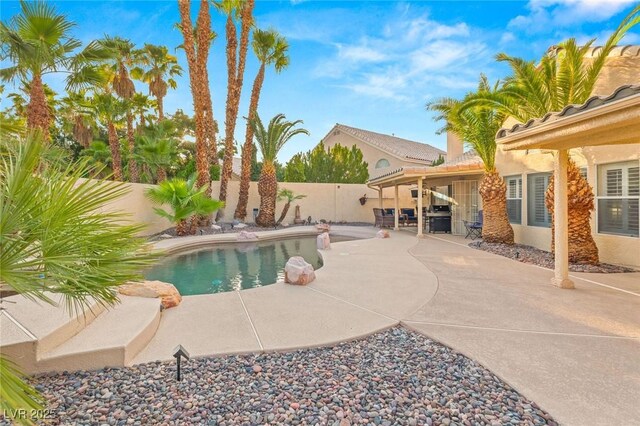 1913 Madagascar Ln, Las Vegas, NV 89117 - view of pool featuring a fenced backyard, a patio, and a grill