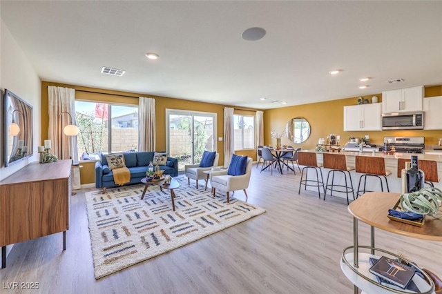 815 Calm Crystal Ct Lot 146, North Las Vegas, NV 89081 - living room featuring light wood-style floors and recessed lighting