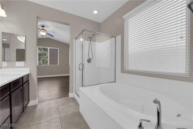 7300 Lavender Rose Ave, Las Vegas, NV 89117 - full bath featuring vaulted ceiling, a shower stall, a bath, vanity, and ceiling fan
