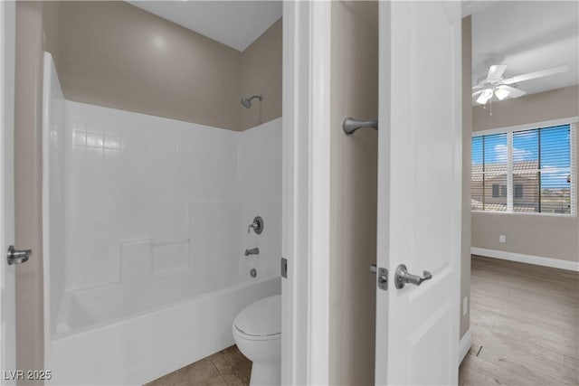 7300 Lavender Rose Ave, Las Vegas, NV 89117 - bathroom with ceiling fan, shower / washtub combination, toilet, baseboards, and wood finished floors