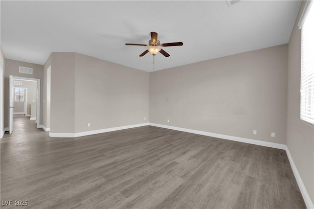 7300 Lavender Rose Ave, Las Vegas, NV 89117 - empty room with ceiling fan, dark wood-style floors, and baseboards