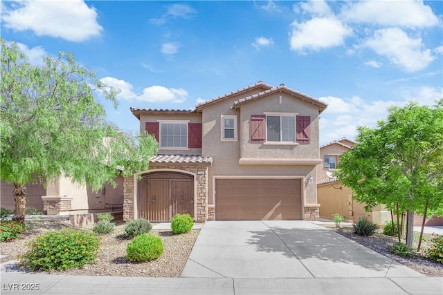 7300 Lavender Rose Ave, Las Vegas, NV 89117 - mediterranean / spanish-style house with a tile roof, stucco siding, stone siding, and a garage
