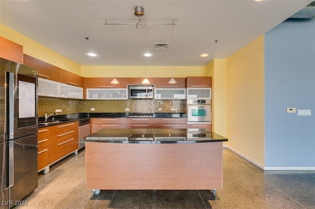 900 Las Vegas Blvd Unit 1209, Las Vegas, NV 89101 - kitchen with appliances with stainless steel finishes, modern cabinets, dark countertops, tasteful backsplash, and recessed lighting